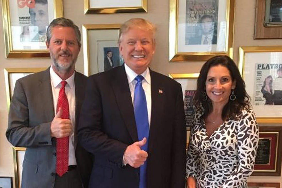 President Trump and Jerry Falwell Jr. giving the thumbs-up while standing with Falwell's wife and looking like the trio of assholes they are.