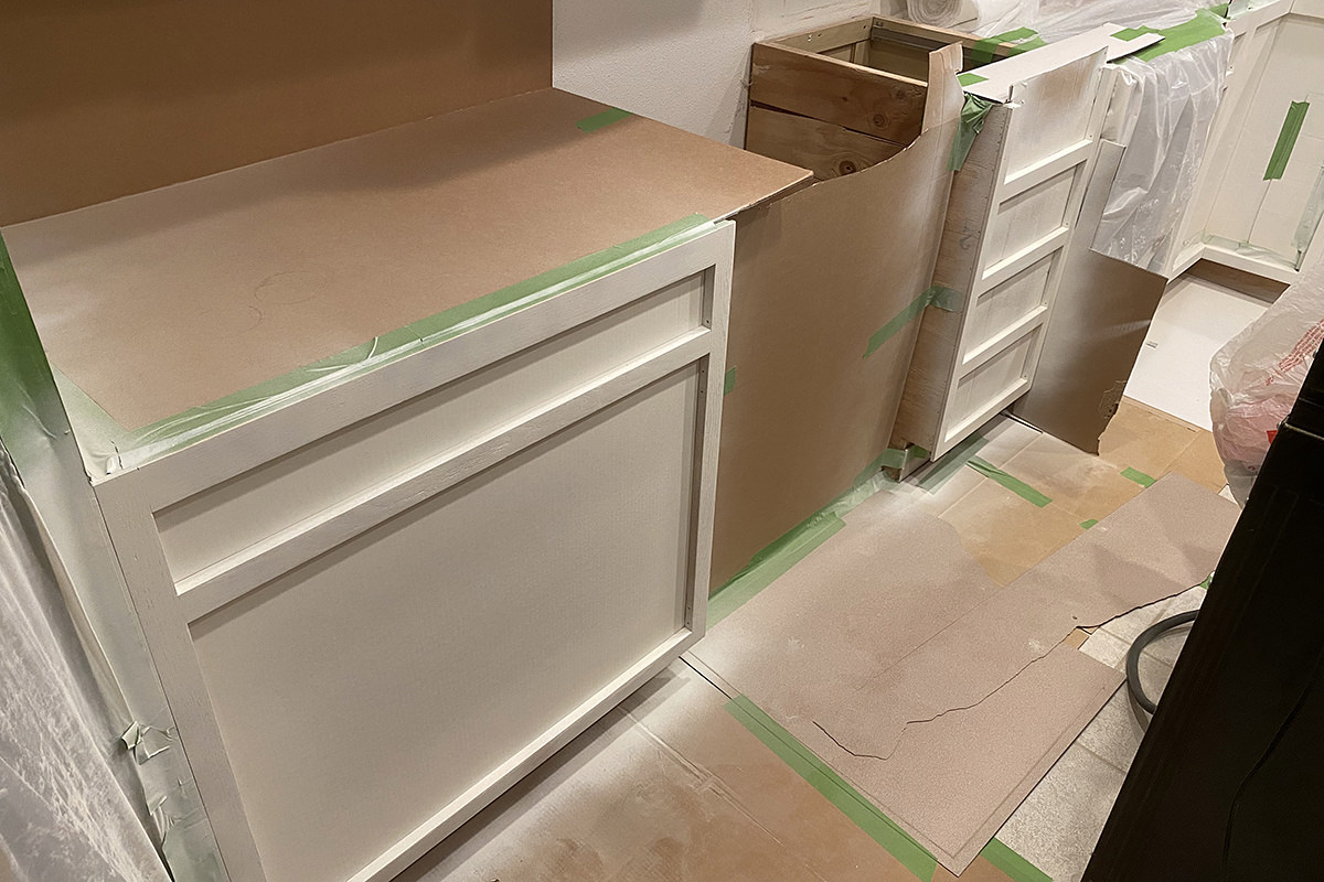 A mess in my kitchen as my cabinets get painted.