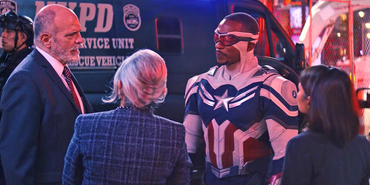 Sam Wilson talking to the UN delegates as Captain America while the world watches.