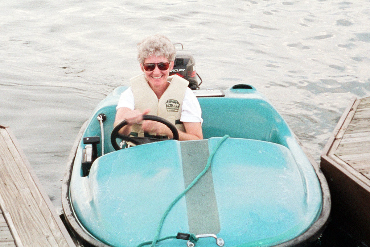 Mom in a mini speedboat.