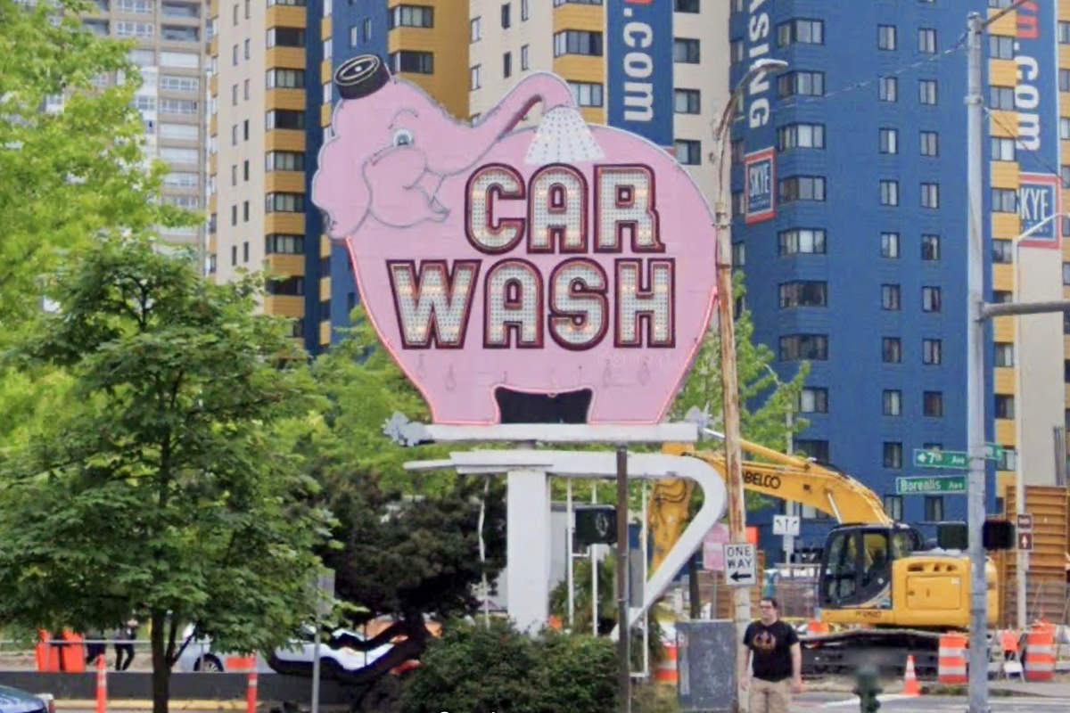 The pink elephant Car Wash sign on a Seattle street.