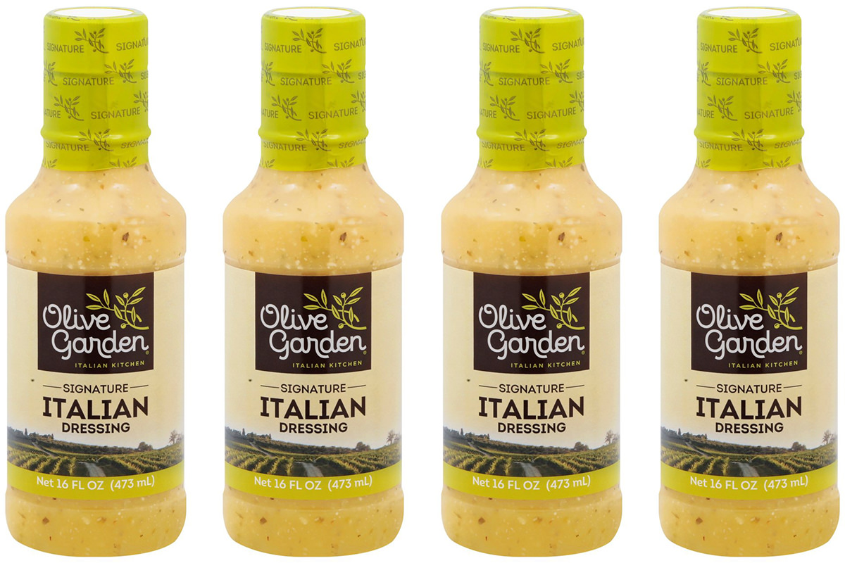 Four bottles of Olive Garden Signature Italian Dressing.