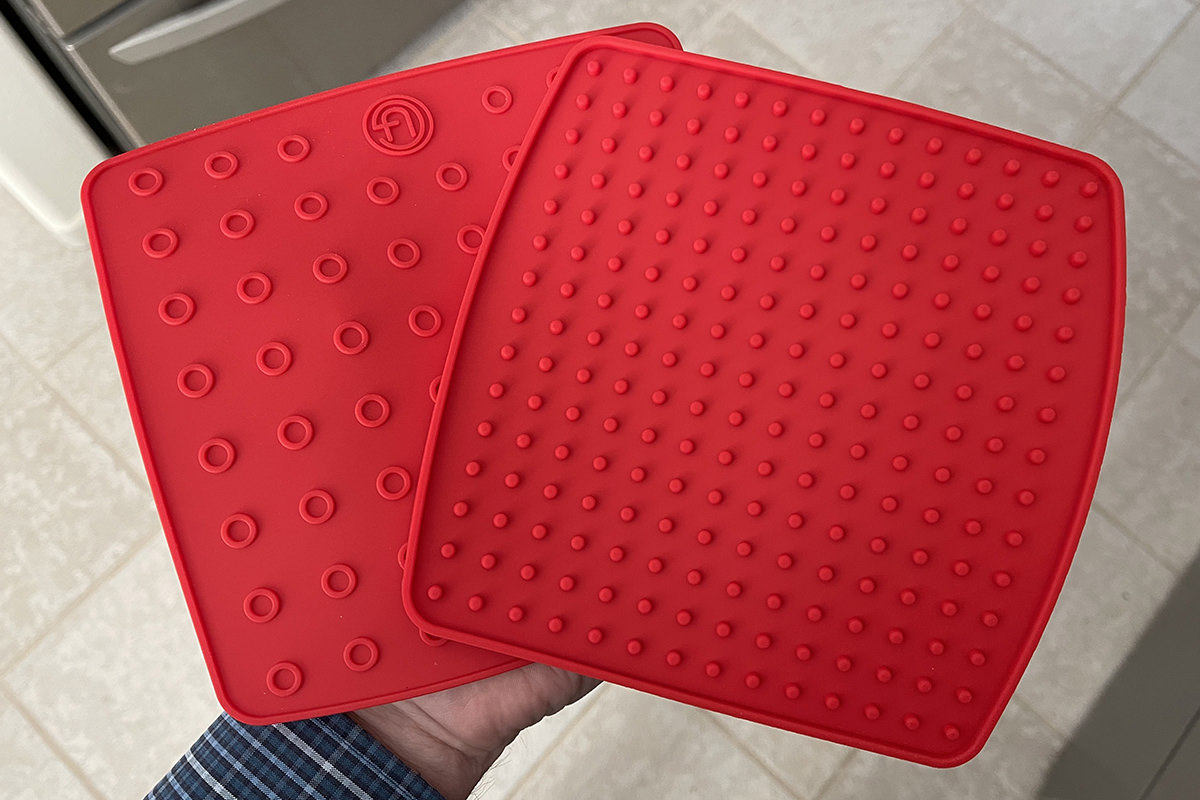 My two new silicone potholders all pretty and red.