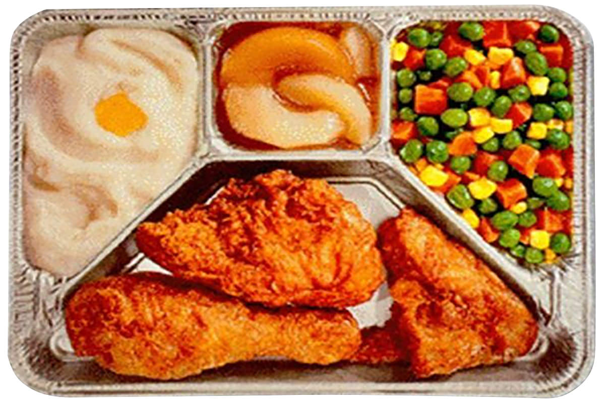 A Swanson TV dinner in aluminum tray.