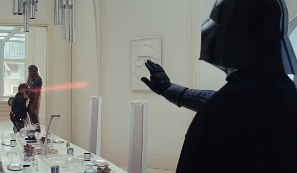 Han Solo fires at Darth Vader!