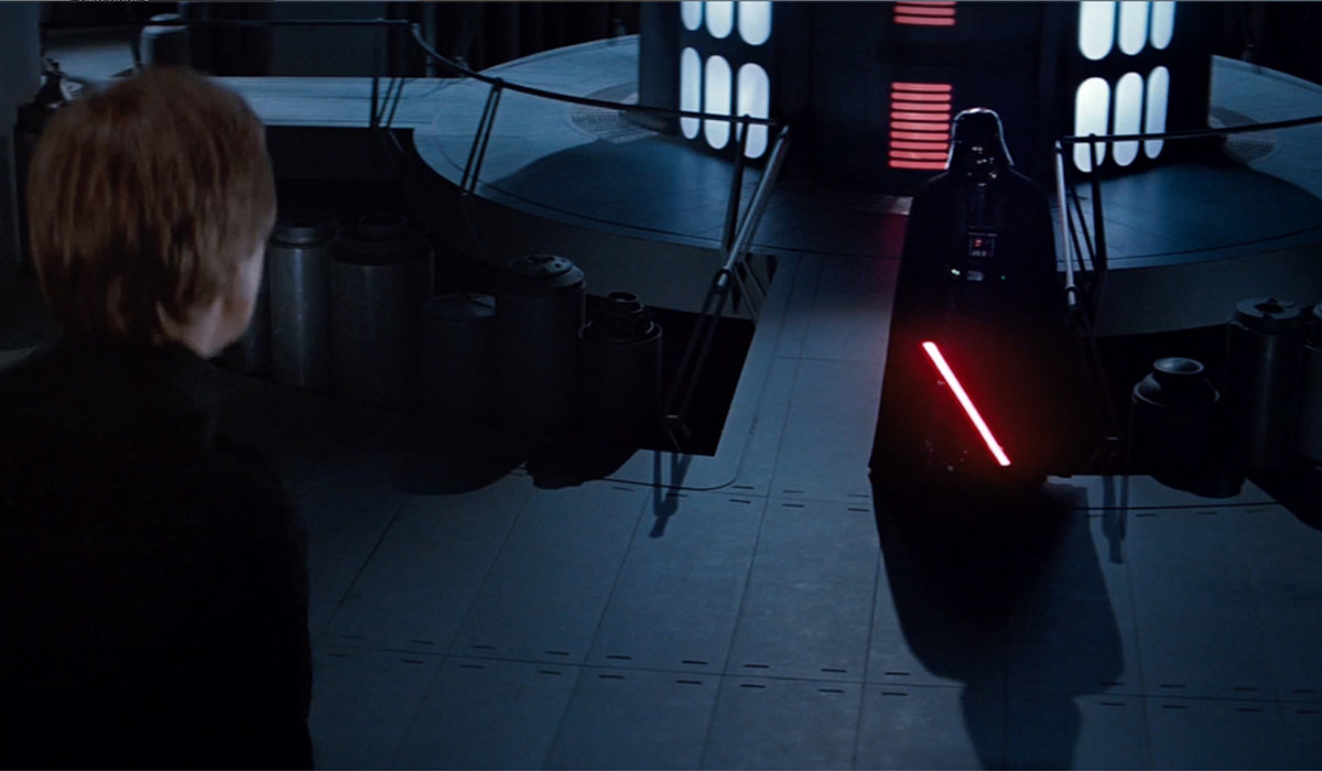 Darth Vader waits for Luke, his saber glowing!