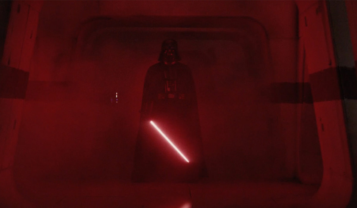 Darth Vader appears, red lightsaber glowing!