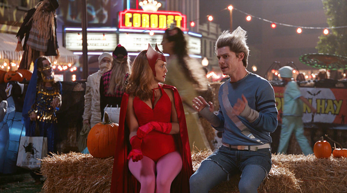 Wanda and Pietro sitting on bales of hay discussing their unreality.