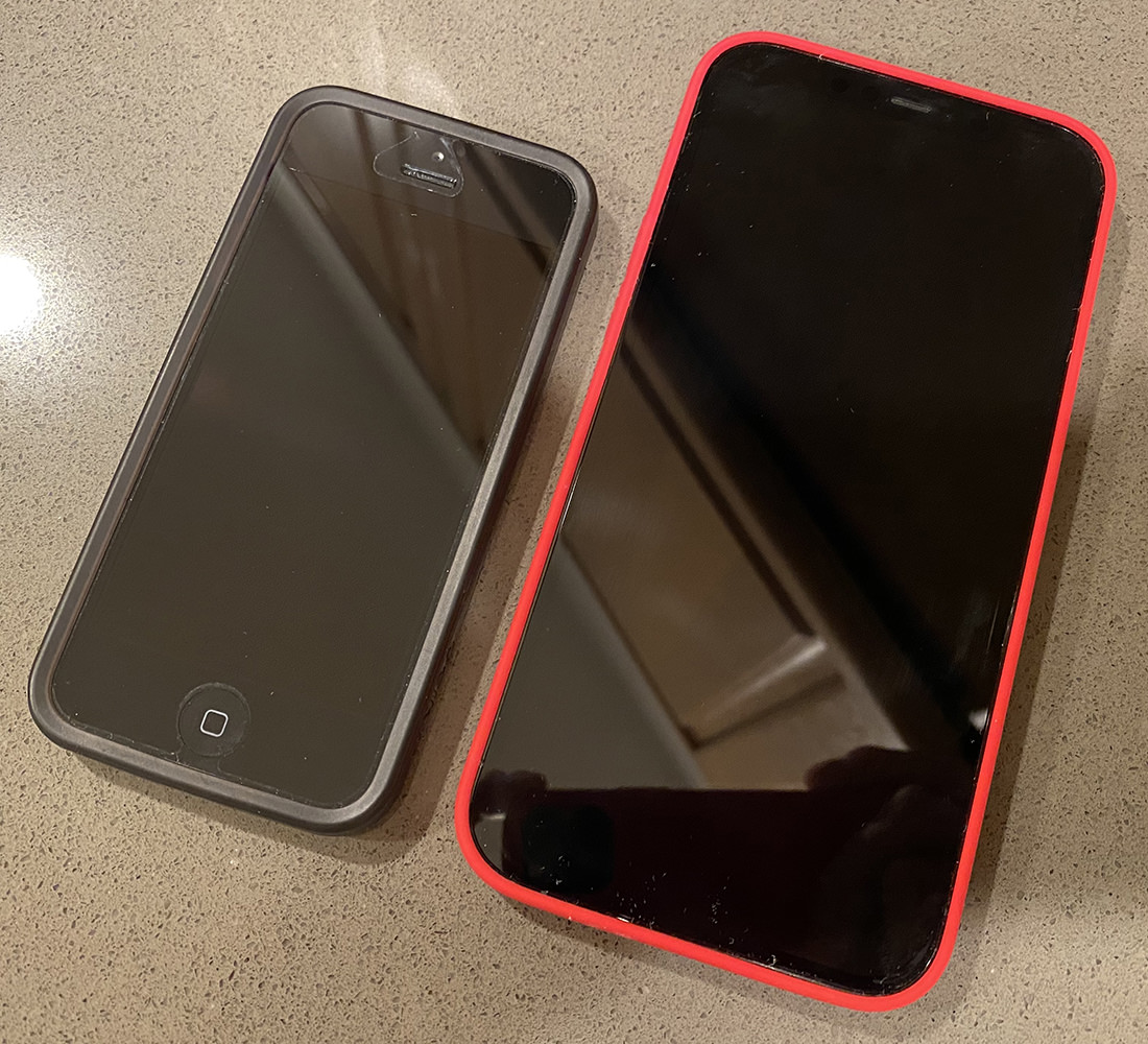 The tiny iPhone 5 next to my new iPhone 12 Pro MAX.