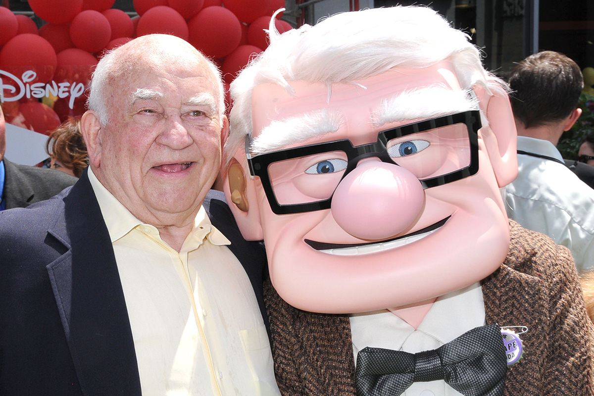 Ed Asner at the premier of Disney/Pixar's UP, standing next to a person dressed up as his character, Carl Fredrickson.