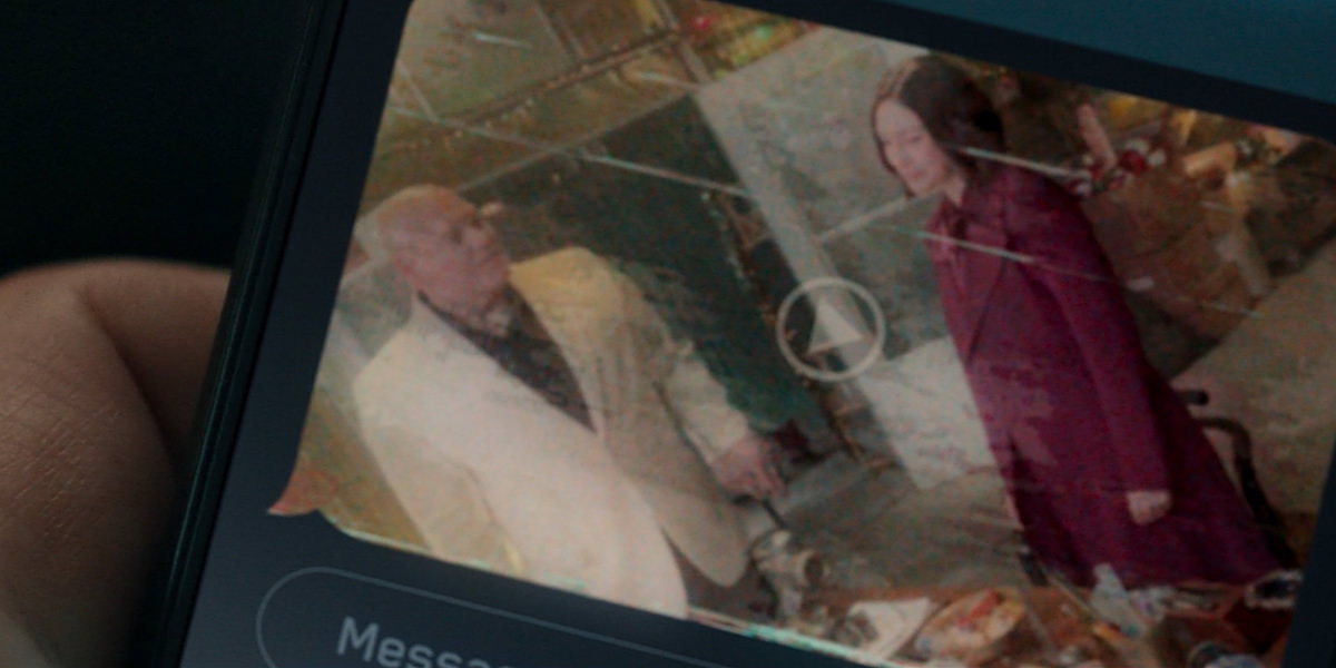 A photo of Elanor with The Kingpin sent to Kate's mobile phone by Yelena.