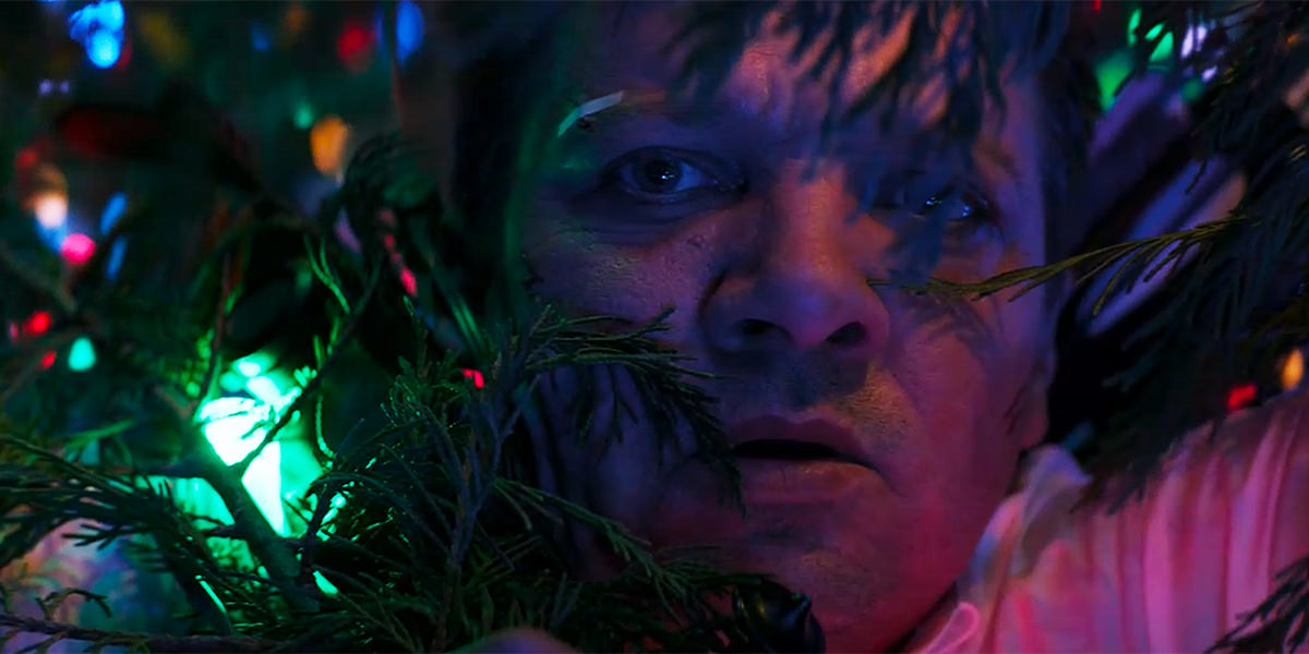 Clint Barton up a giant Christmas tree