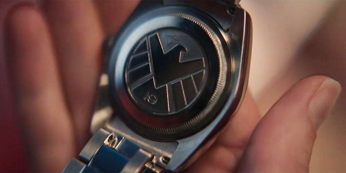 A SHIELD logo is on the back of the watch