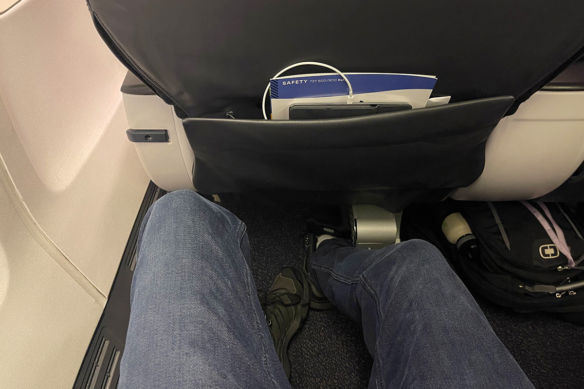 The ample legroom that comes with a First Class seat.