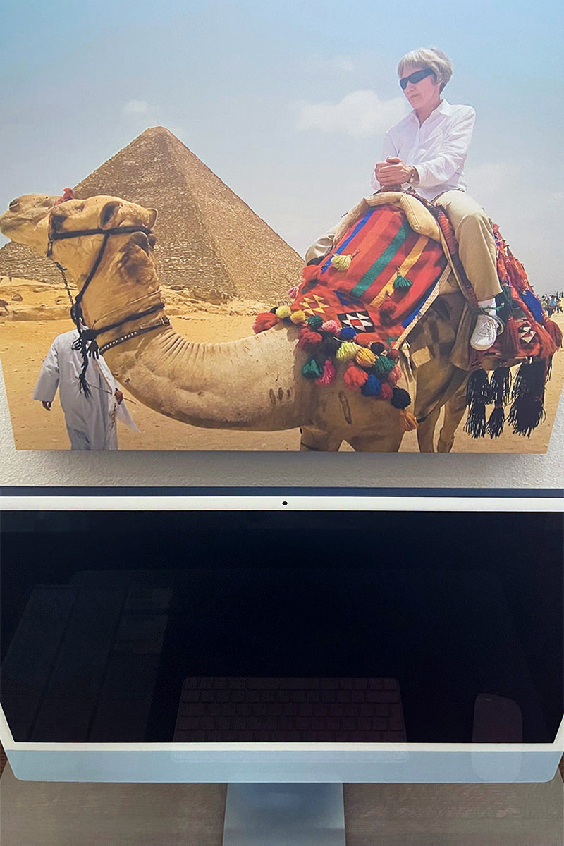 Looking down from a photo of my mom riding a camel at the pyramids of Egypt with my new iMac, Lemon, sitting below.