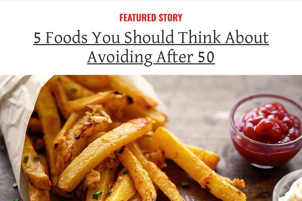 5 Foods You Should Think About Avoiding After 50: a photo of French fries with ketchup is showing.