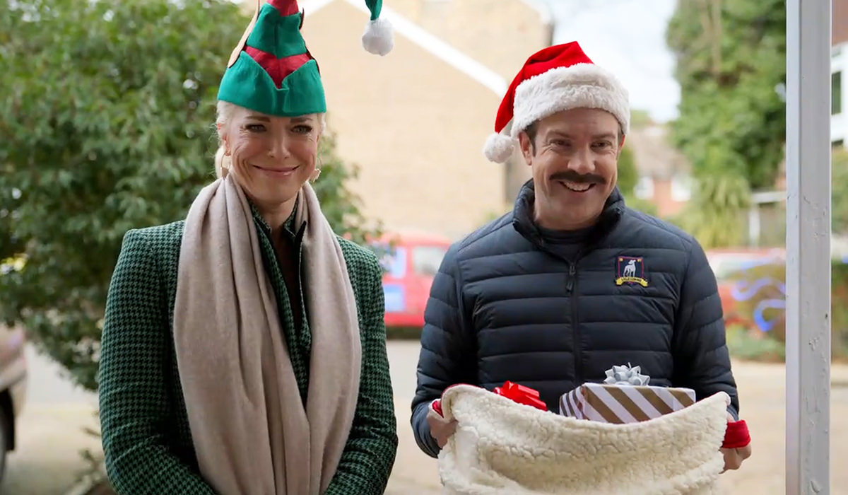 Rebecca and Ted are Santa's elves delivering gifts.