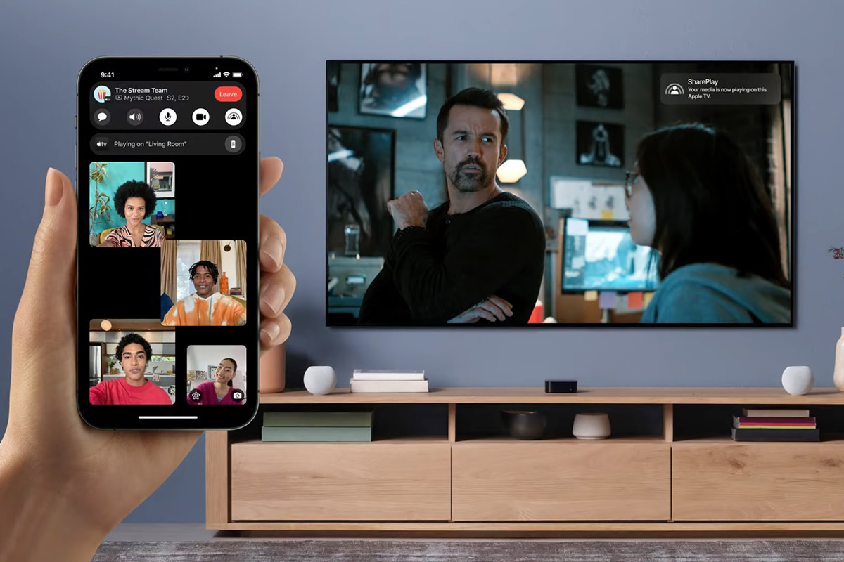 Four people chatting in FaceTime while a video is synced between them on AppleTV.