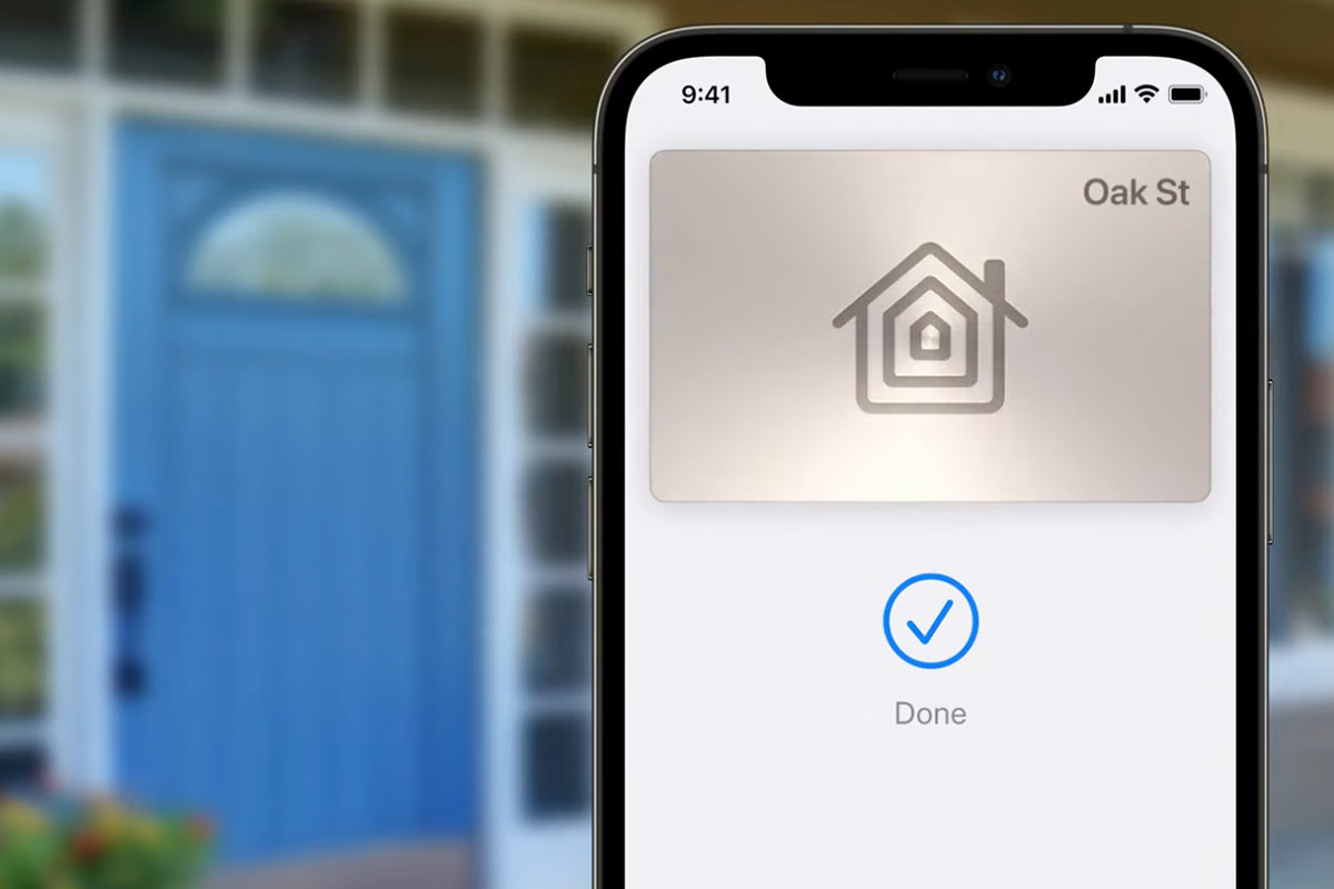 An iPhone wallet unlocking the door to a house.