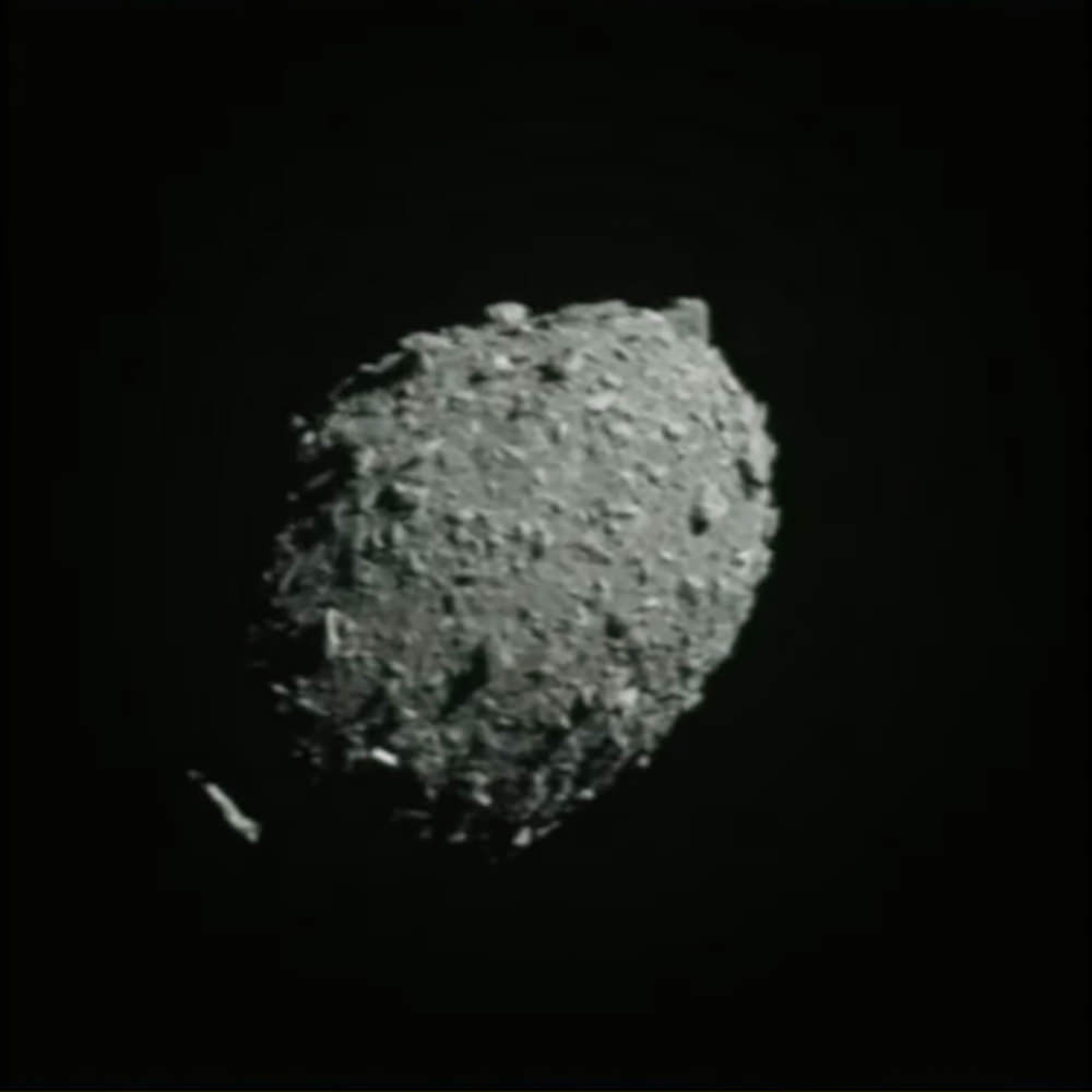 DART crashing into an asteroid.