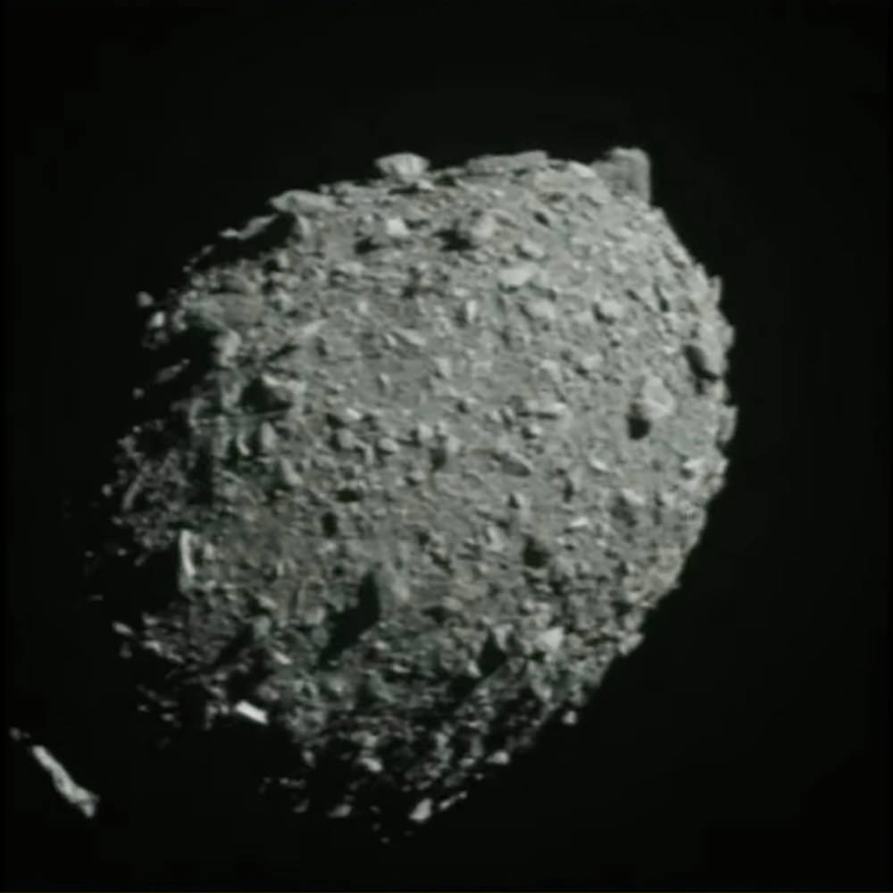 DART crashing into an asteroid.