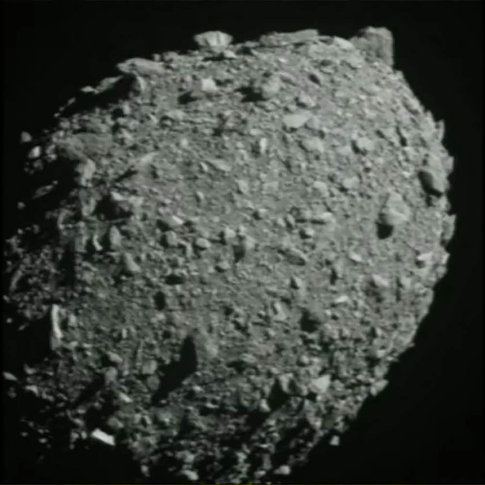 DART crashing into an asteroid.