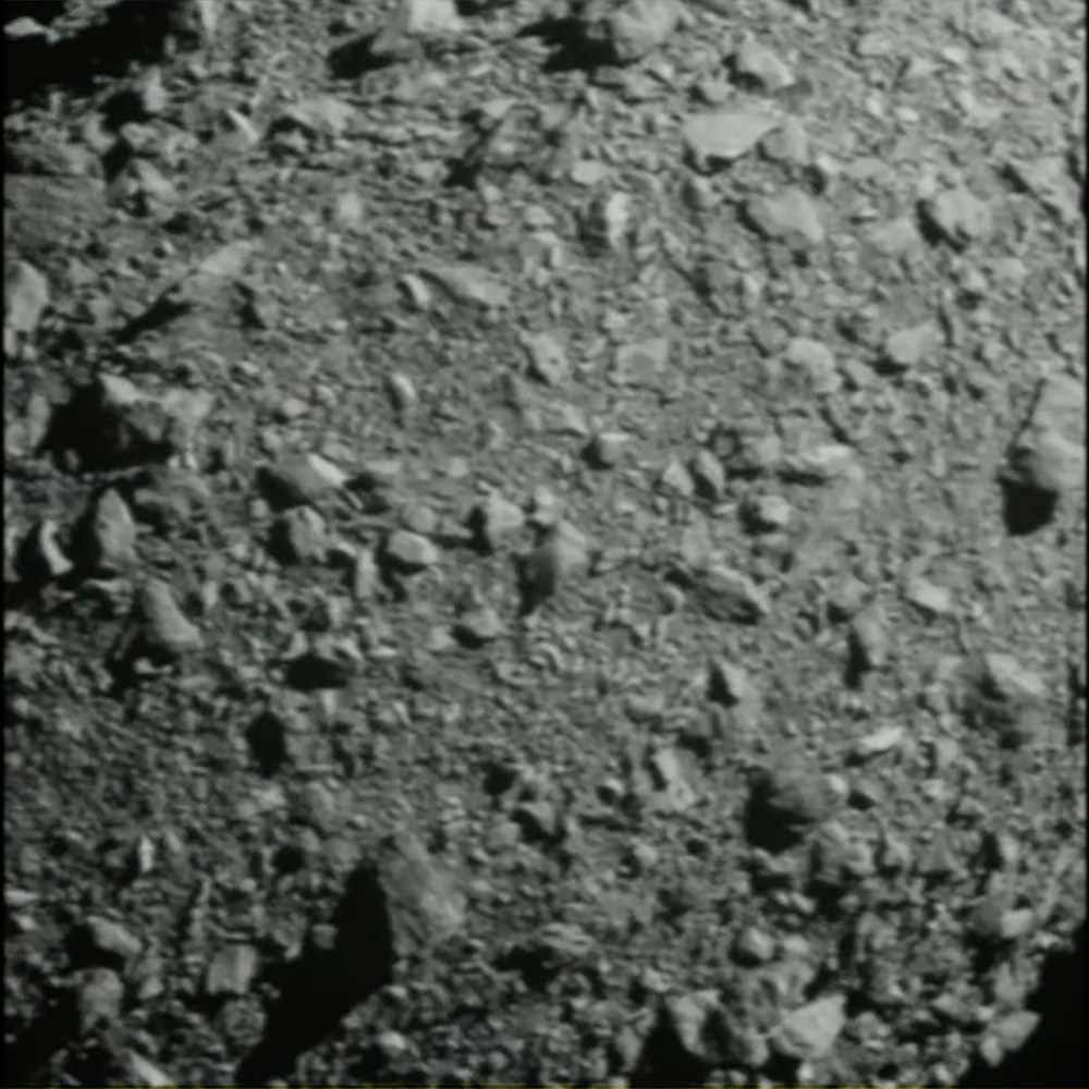 DART crashing into an asteroid.