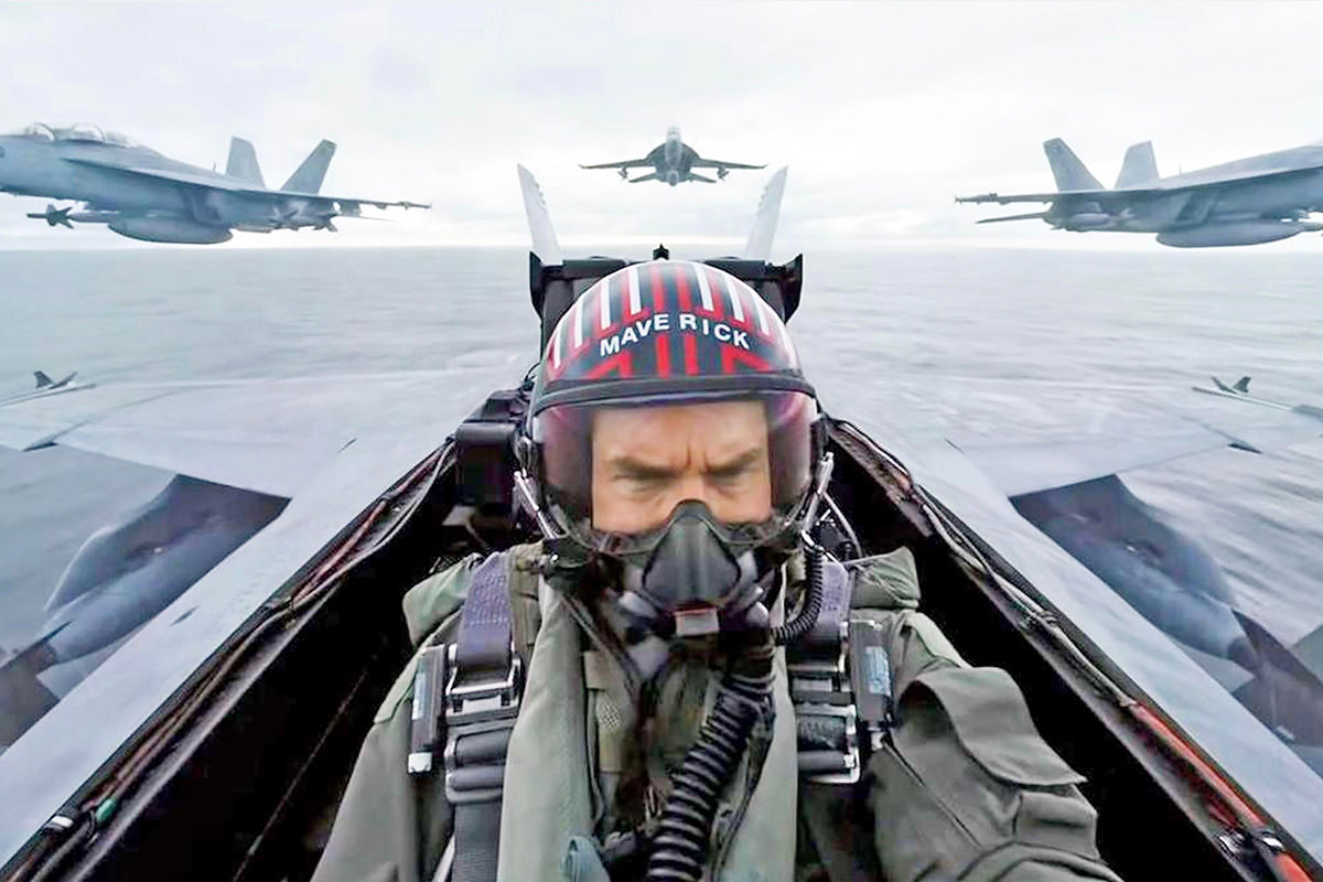 Tom Cruise in a fighter plane cockpit.