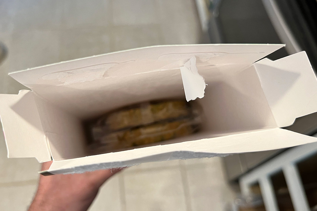 A mostly-empty box of falafel burgers.