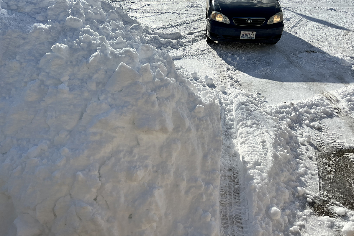 A mountain of snow with my car backed out!