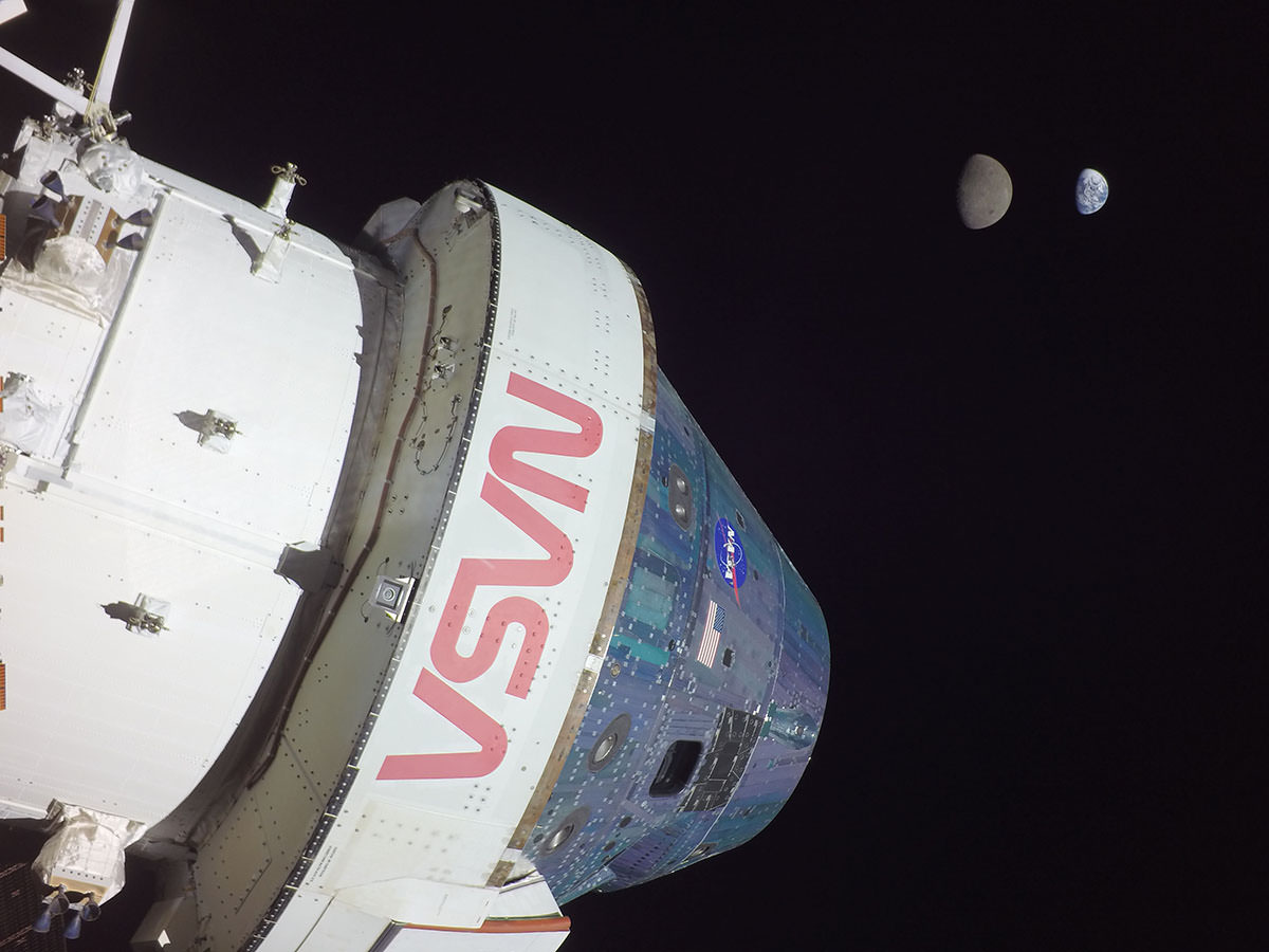 NASA shot of the moon with the earth behind.