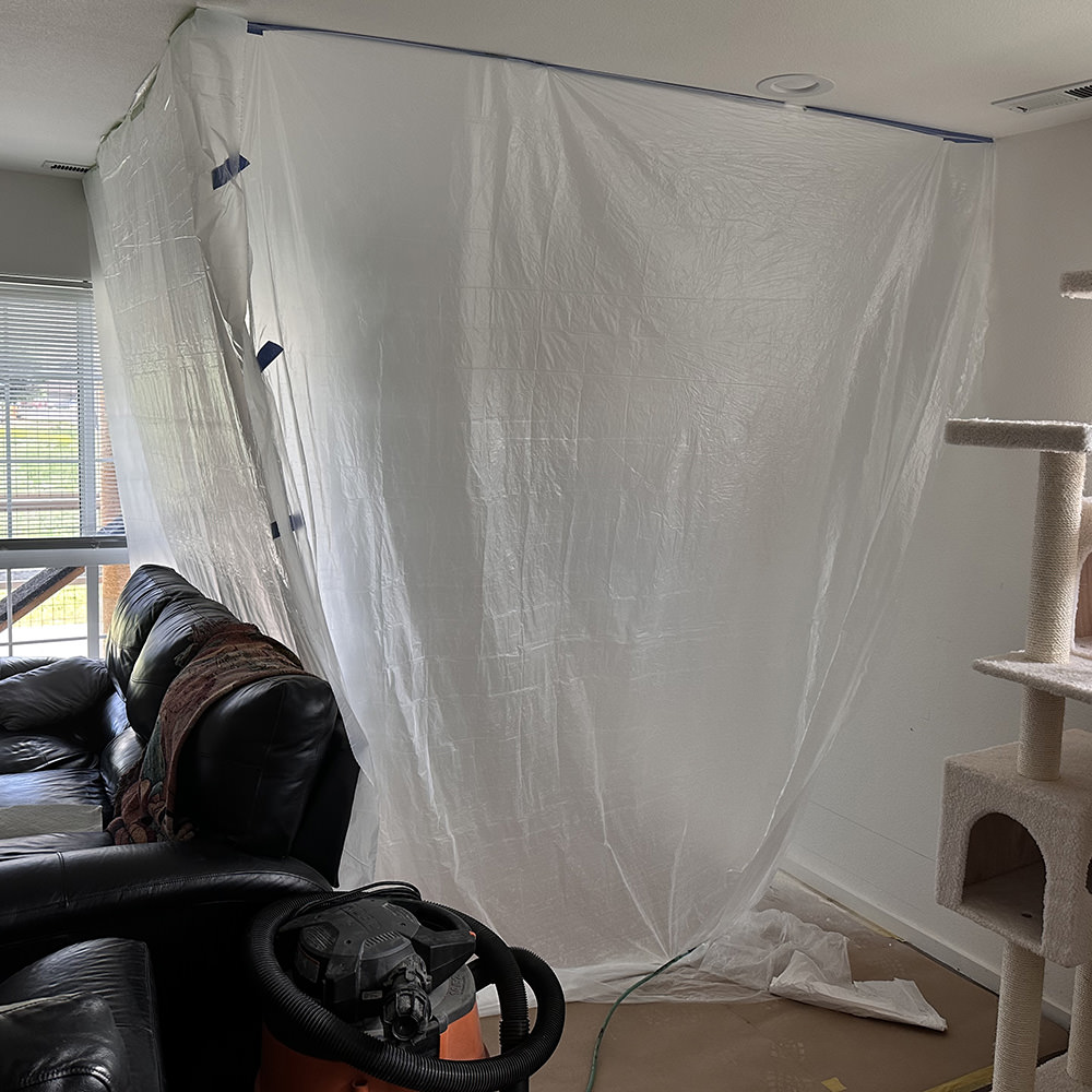 Plastic cornered off my living room.