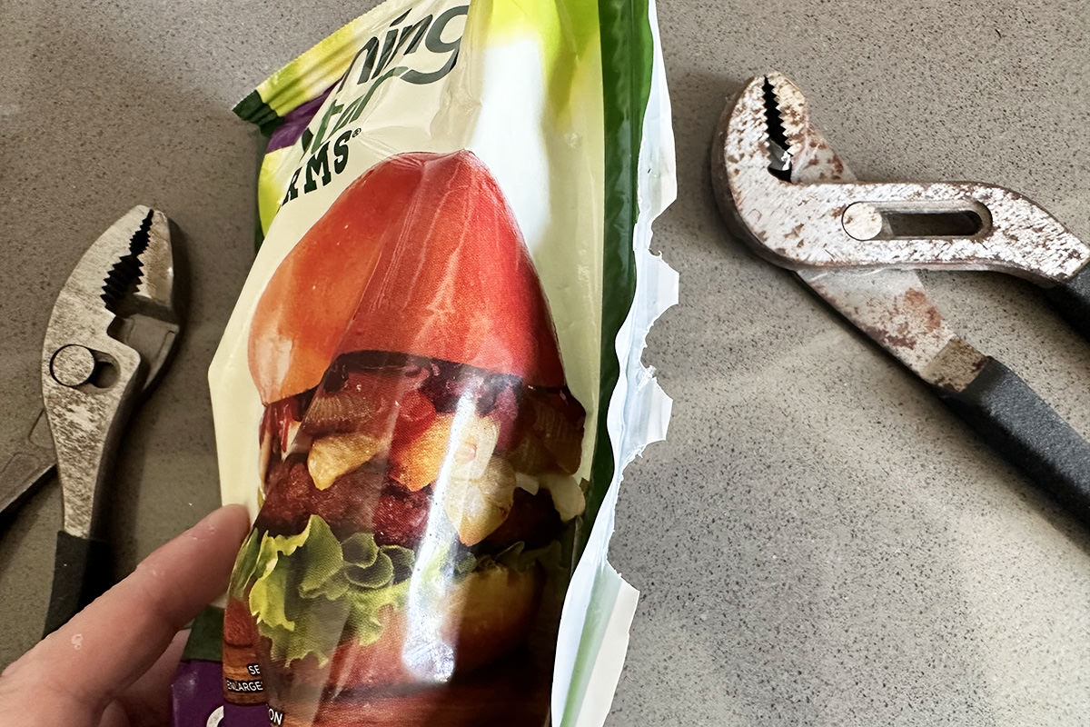 Using fucking pliers to fucking open a fucking bag of fucking Morningstar Farms burgers.