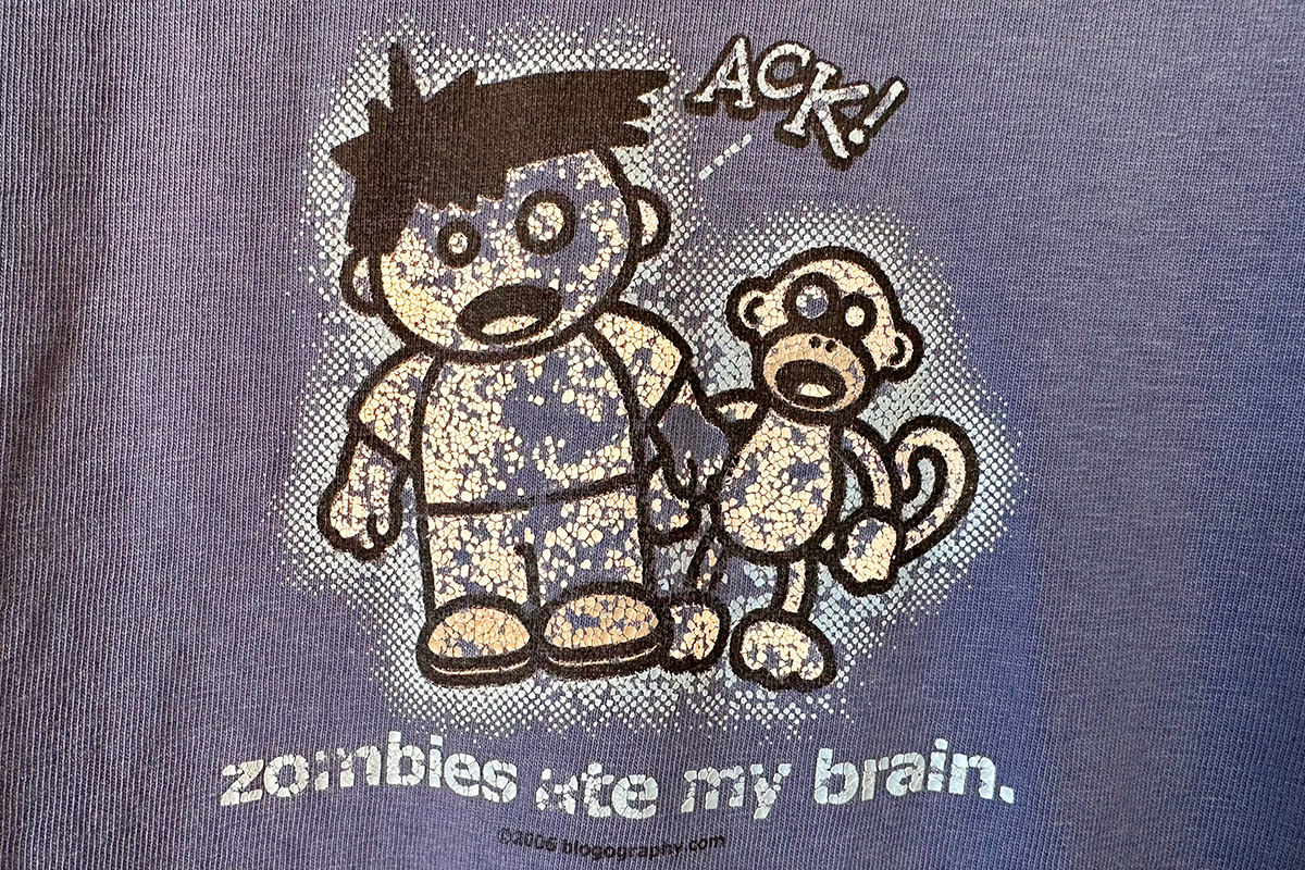 An old and busted Zombies Ate My Brains T-Shirt!