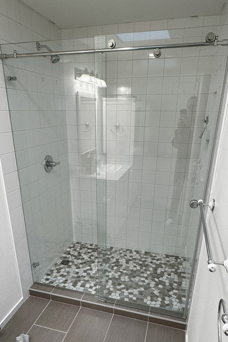 Shower doors are installed.