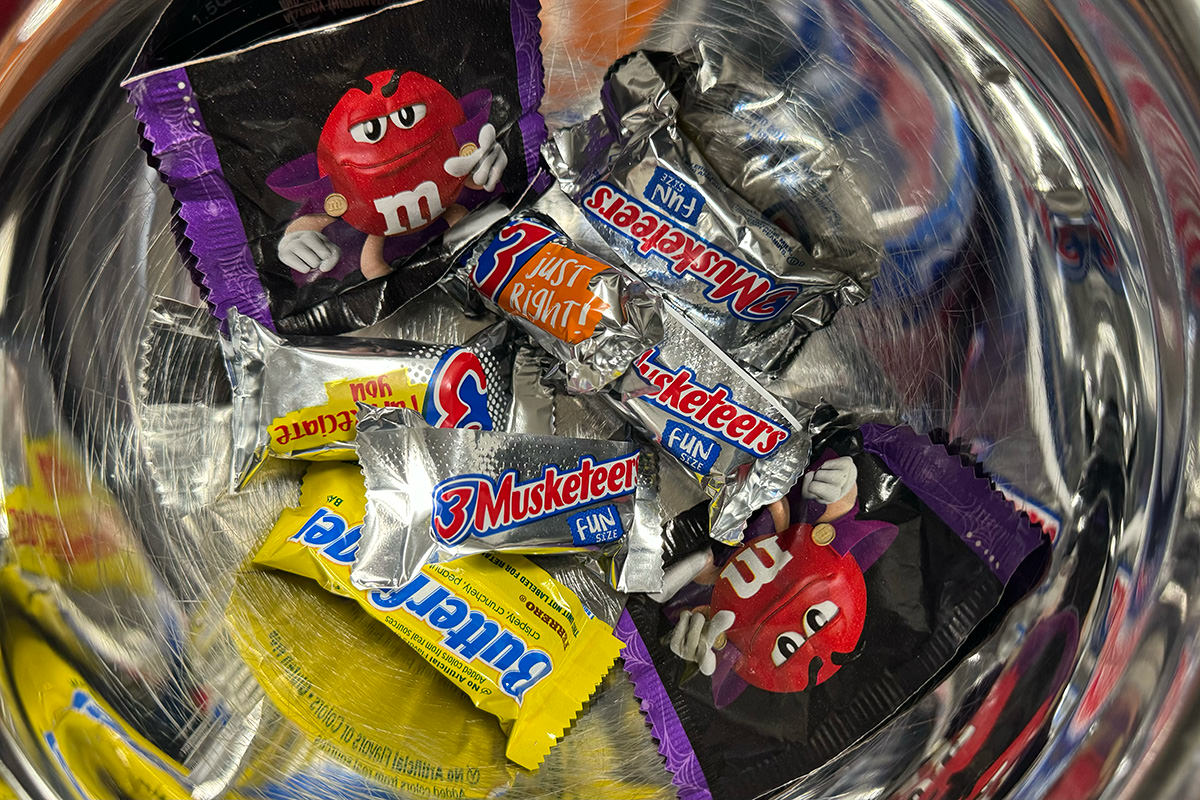 A sad bowl filled with only 8 pieces of candy.