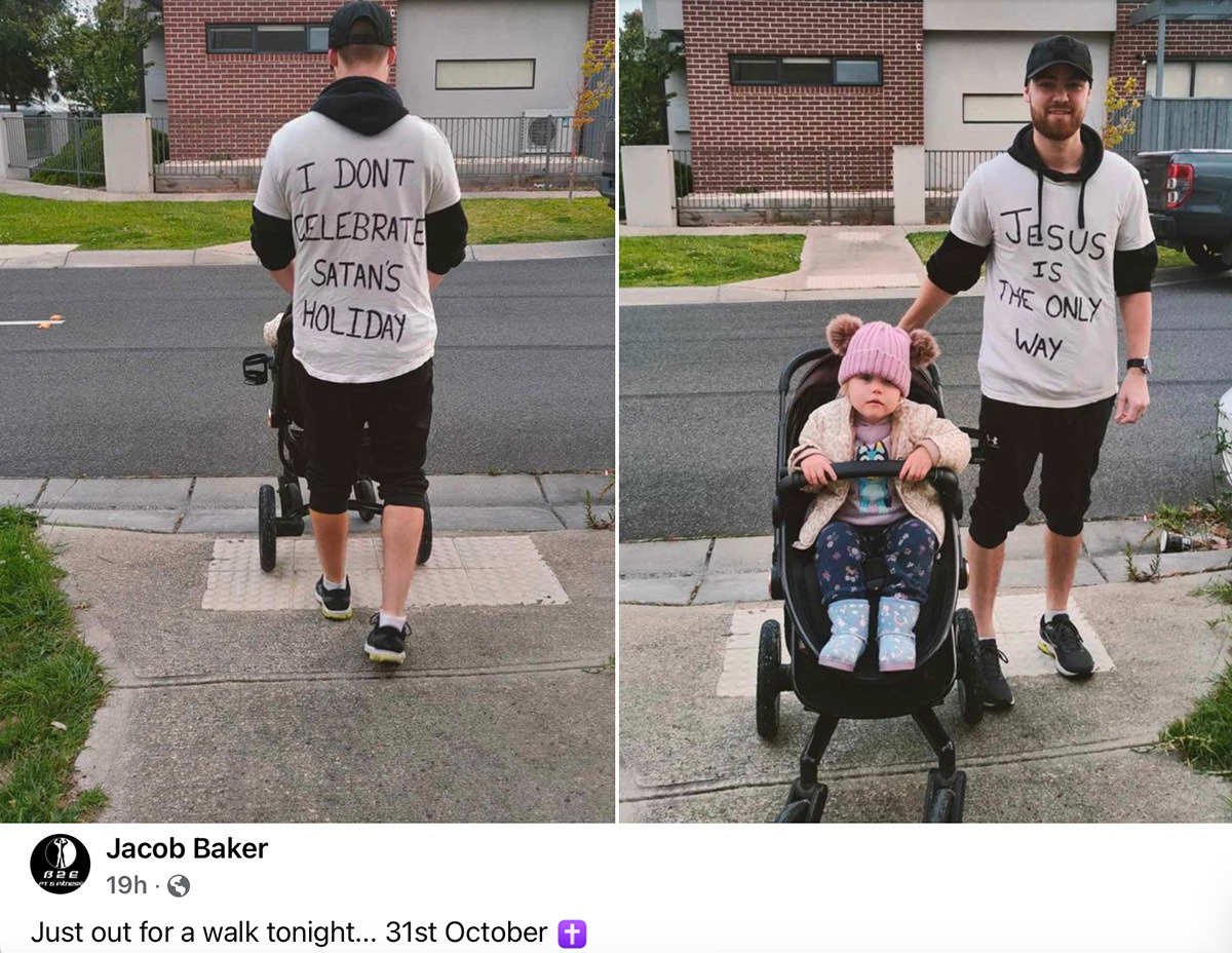 A man wearing a T-shirt which says I DON'T CELEBRATE SATAN'S HOLIDAY JESUS IS THE ONLY WAY.