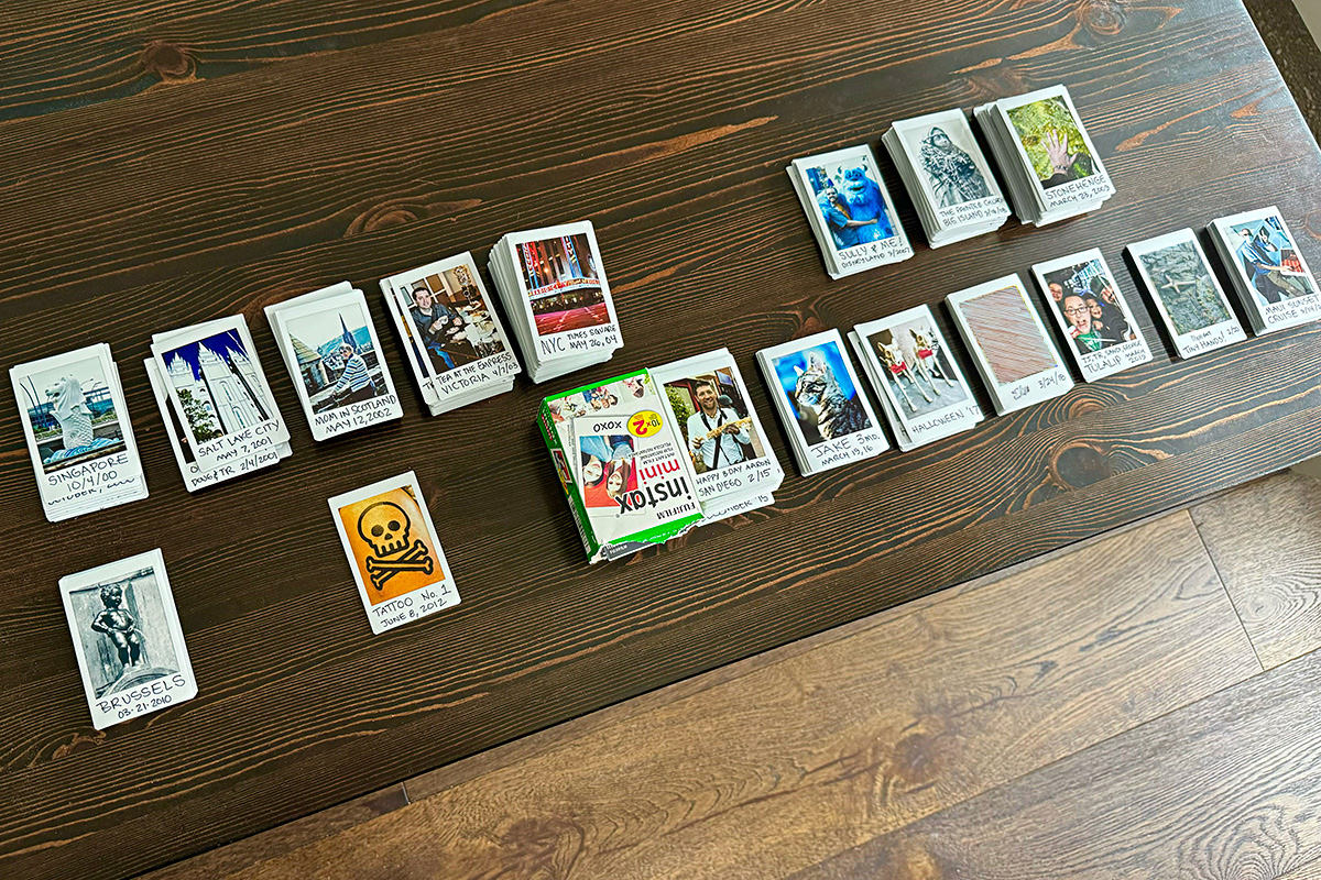 Little Polaroids on a coffee table.