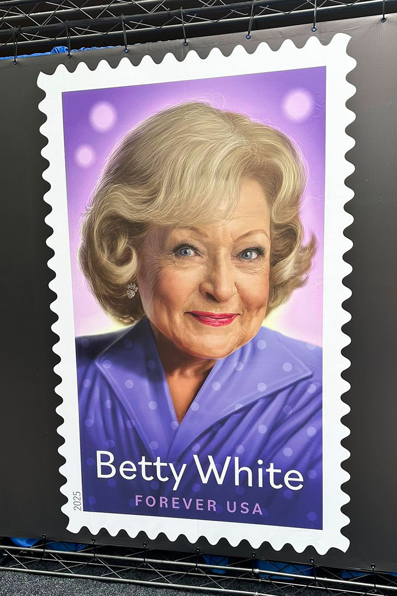 Giant poster of Betty's stamp at the release event.