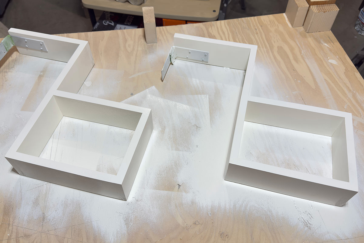 Painting the stair frames.