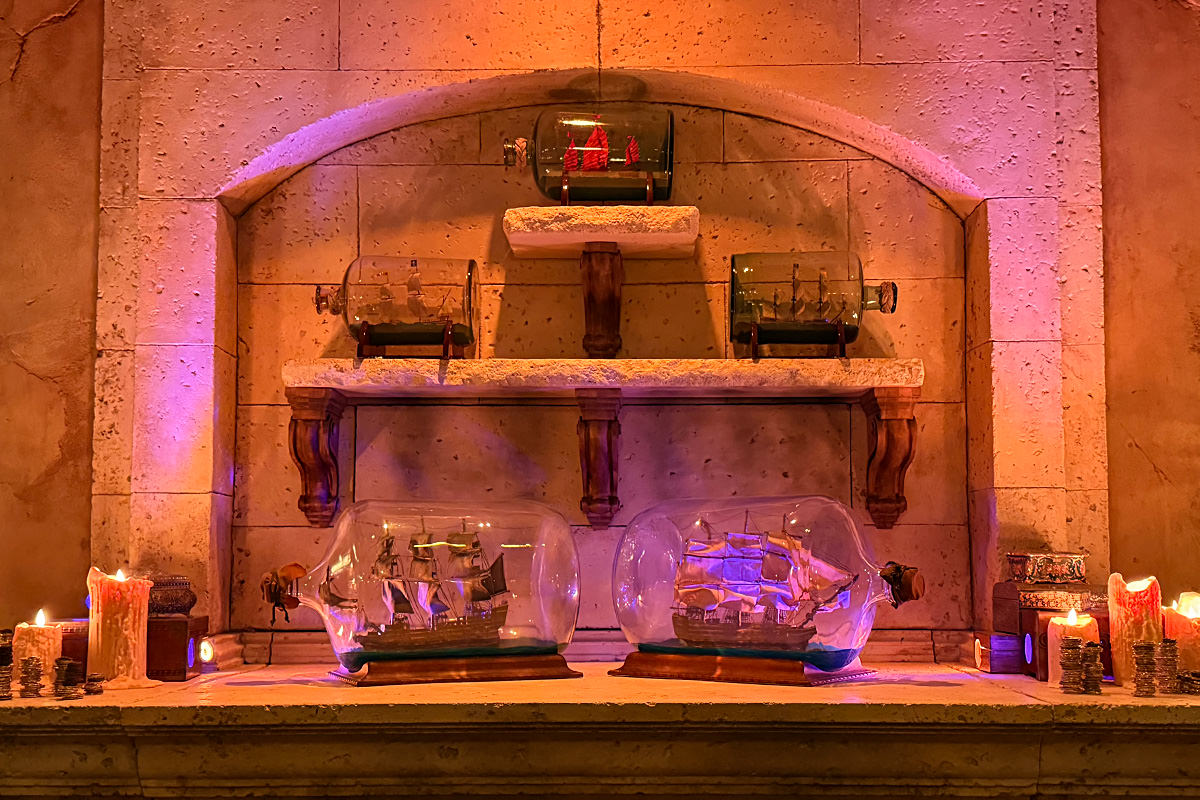 It's bottle ships in the Beak and Barrel Tavern interior!