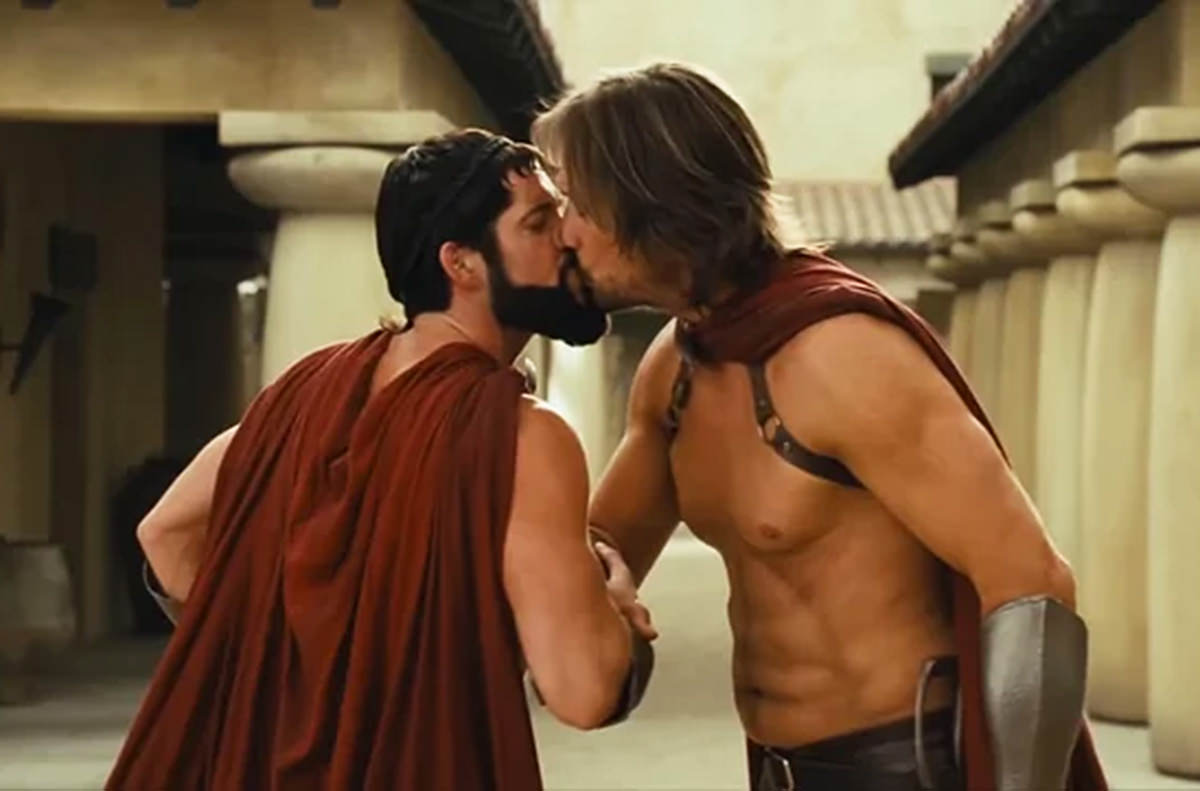 Kevin Sorbo kissing a dude.