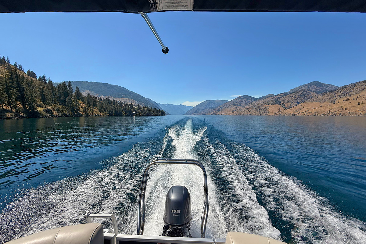 My legs are up on the side of the boat.