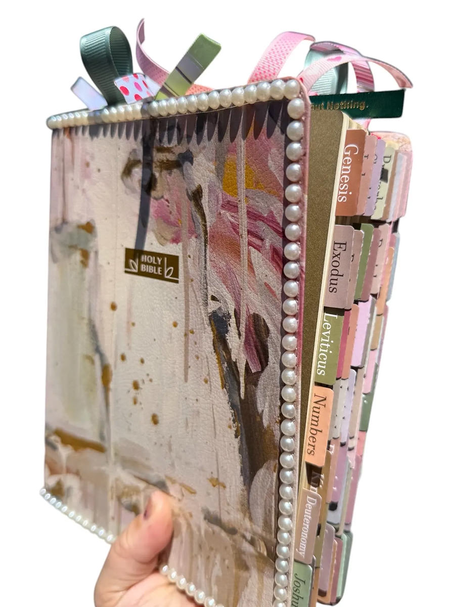 A Loaded Bible with crap all over it.