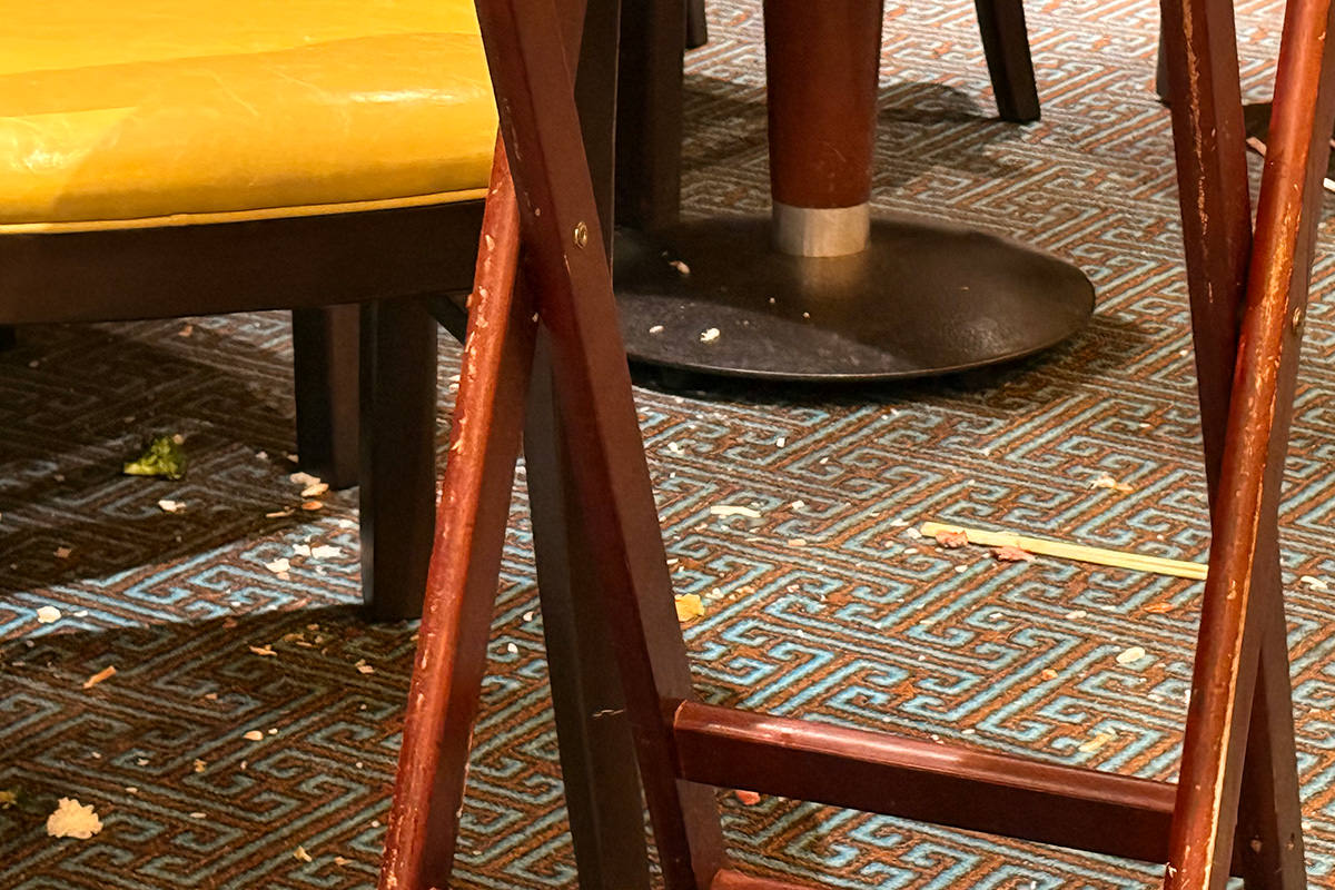 Disaster floor covered with food everywhere.