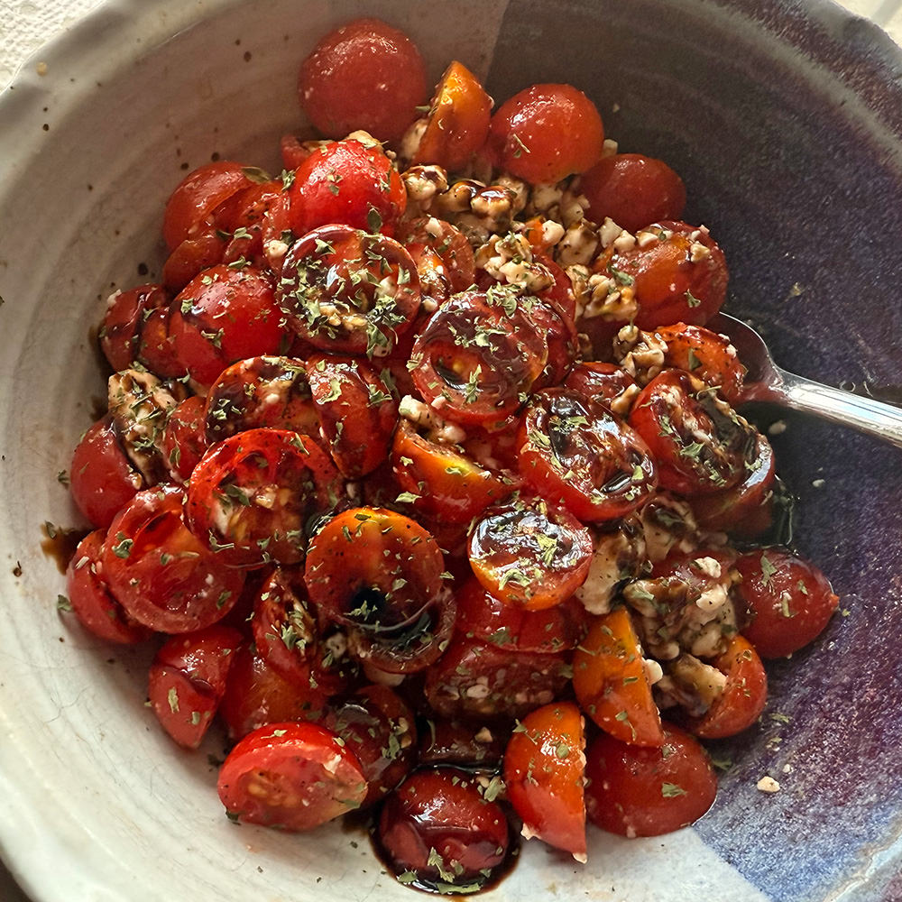 A tomato feta salad with basalamic glaze.