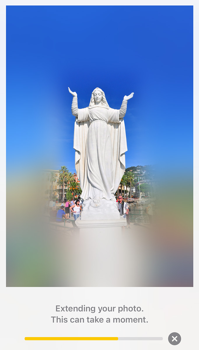 Extending photo of a statue of the Madonna.