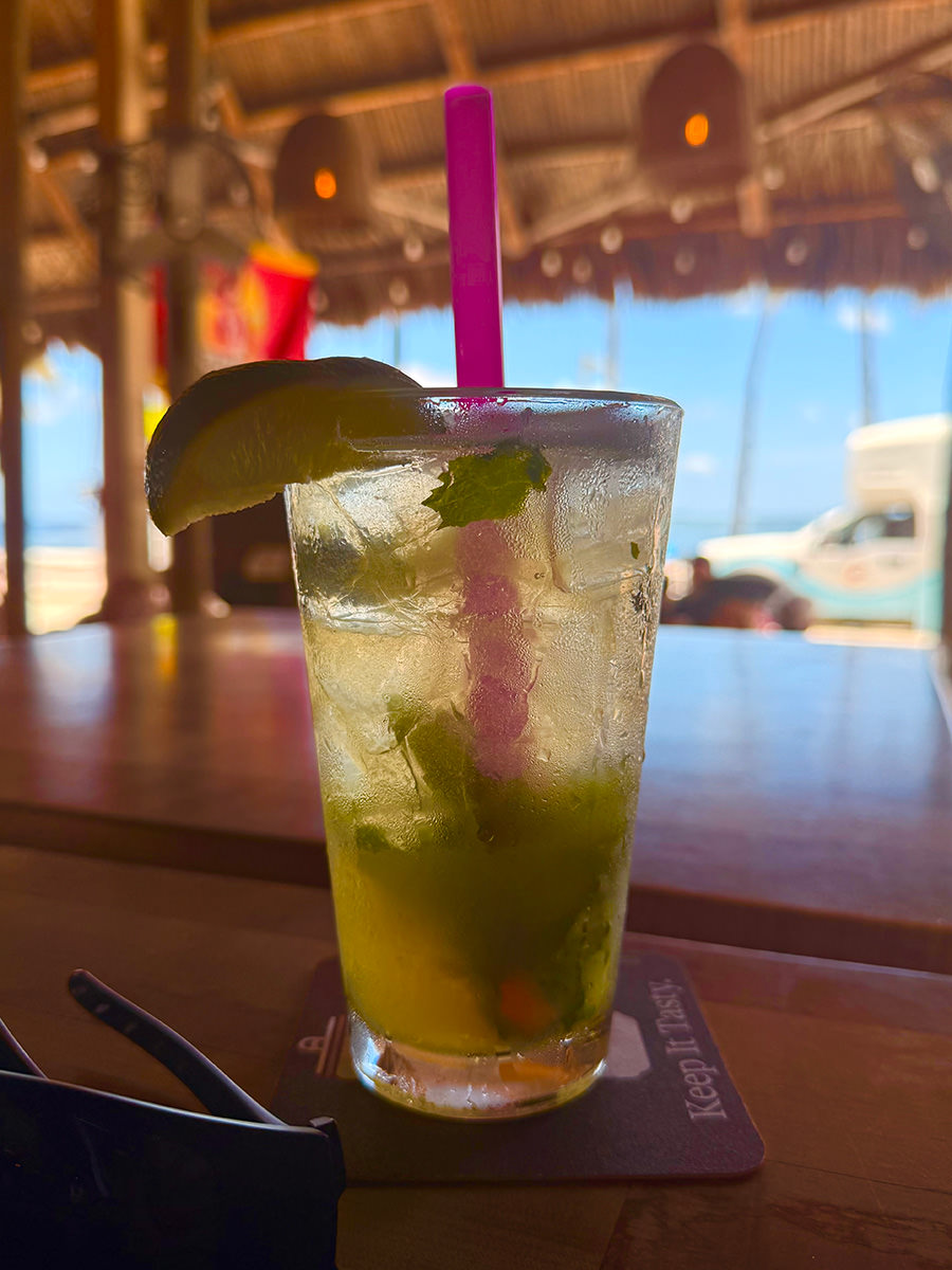 A perfect mojito on a perfect table overlooking a perfect beach.