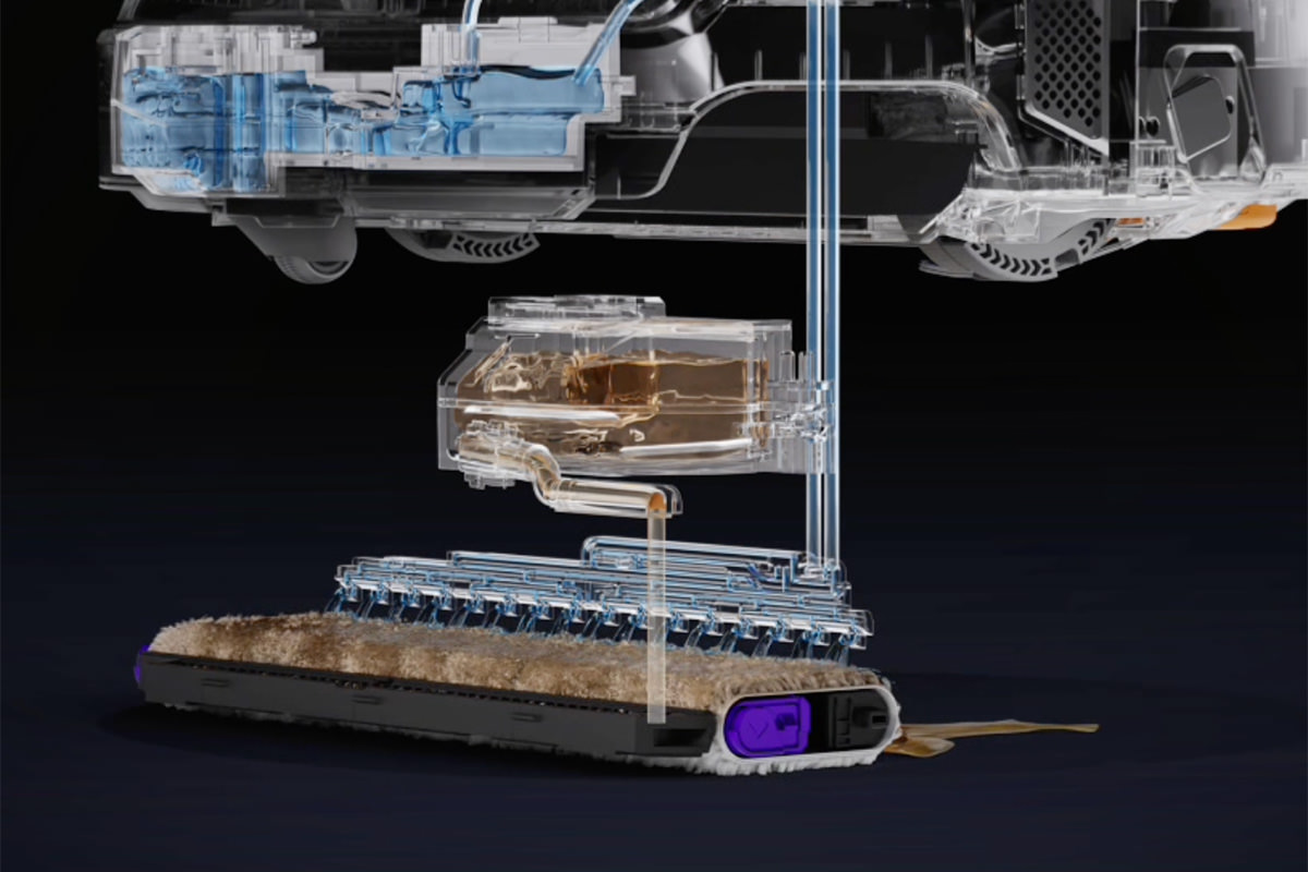 A cut-away view of the Flow 2 cleaning the mopping brush during operation.