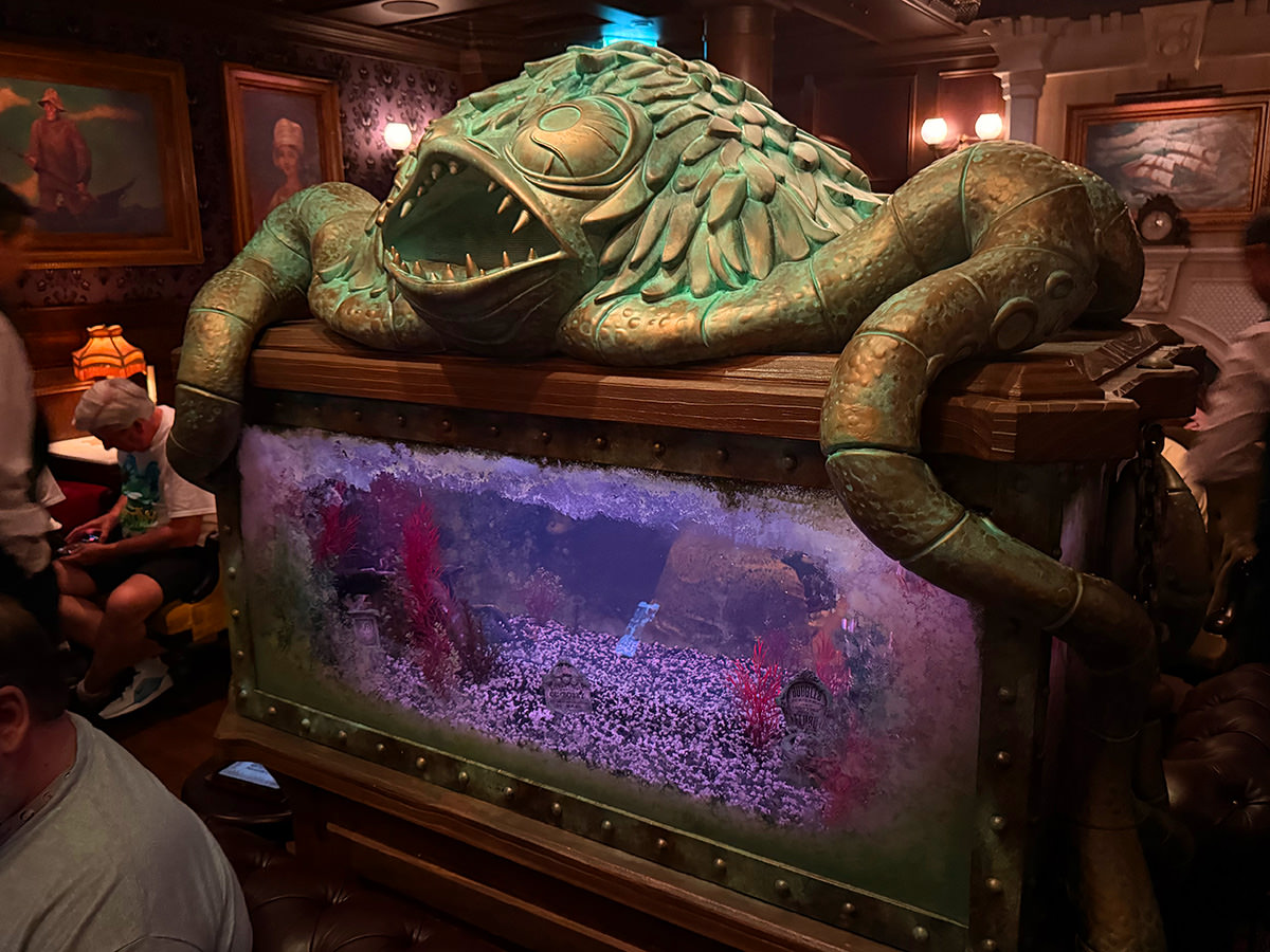 The haunted fish tank in the Haunted Mansion Parlor